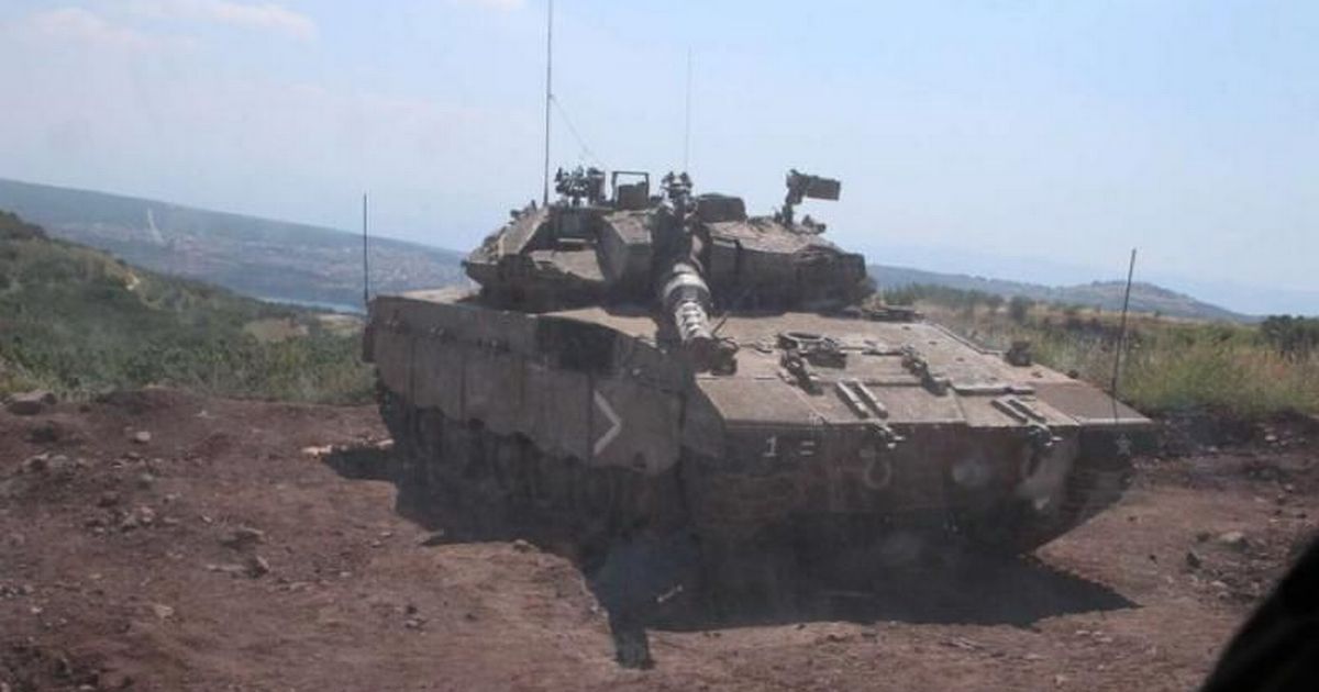 Moment Irish soldiers stare down the barrel of an Israeli tank outside their post in war-torn Lebanon