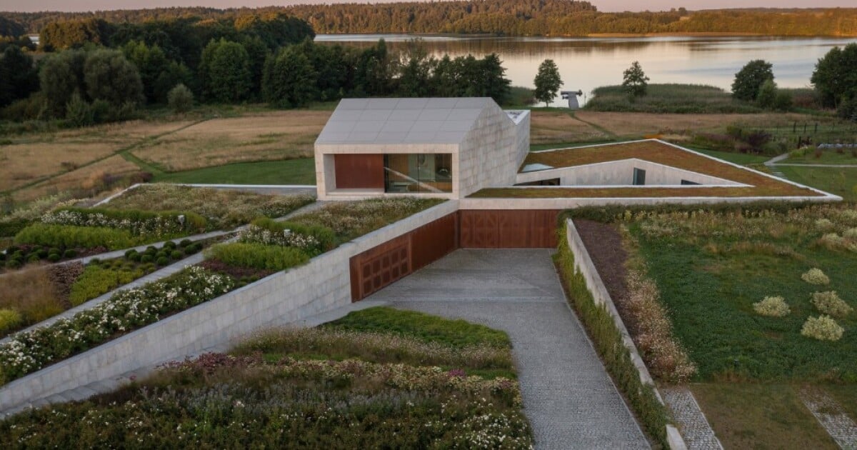 Green roofs and rustic charm unite in a contemporary masterpiece