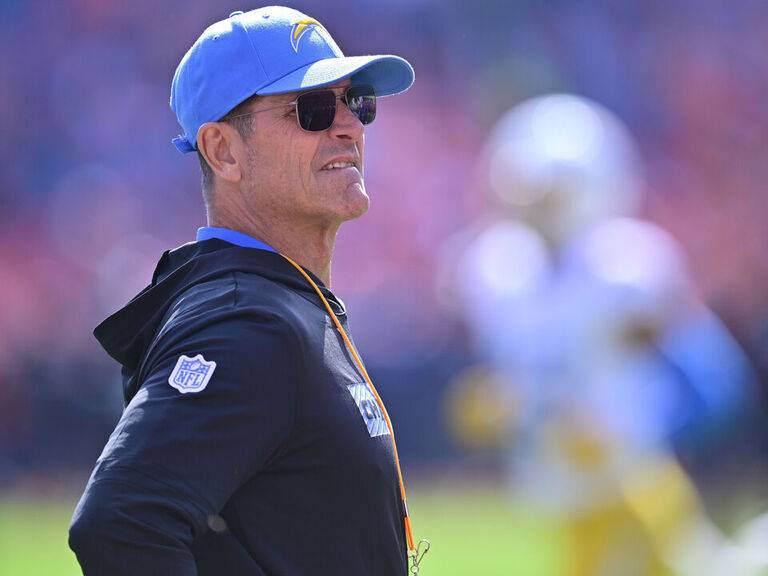 Chargers' Harbaugh briefly leaves sideline with illness