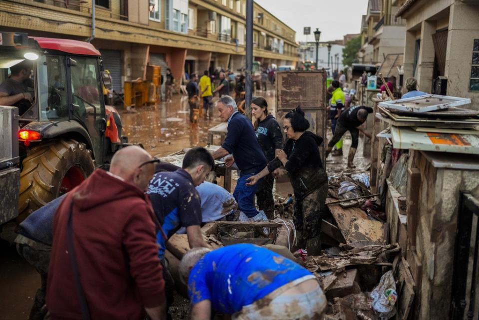 Spain searches for bodies after flood of the century claims at least 95 lives