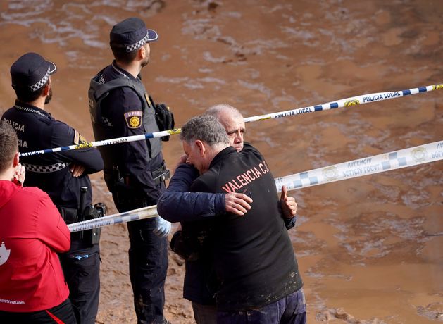 Spain flood death toll hits 205 as Valencia opens temporary morgue