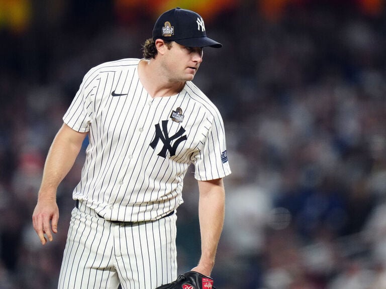 Report: Cole stays with Yankees on original 4-year deal