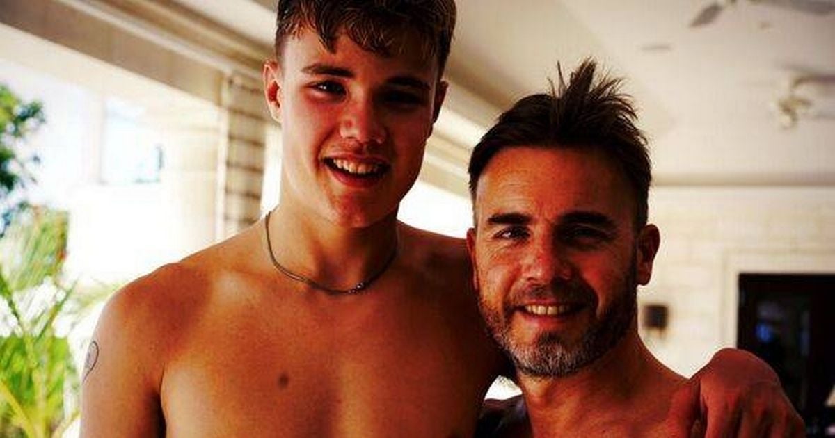 Gary Barlow pokes fun at son's staggering height as they work out together on camera