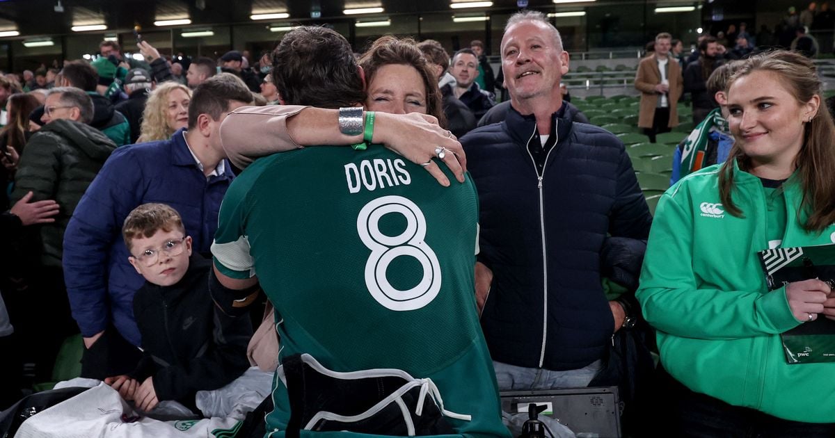 Ireland players embrace with families after loss to New Zealand in Dublin