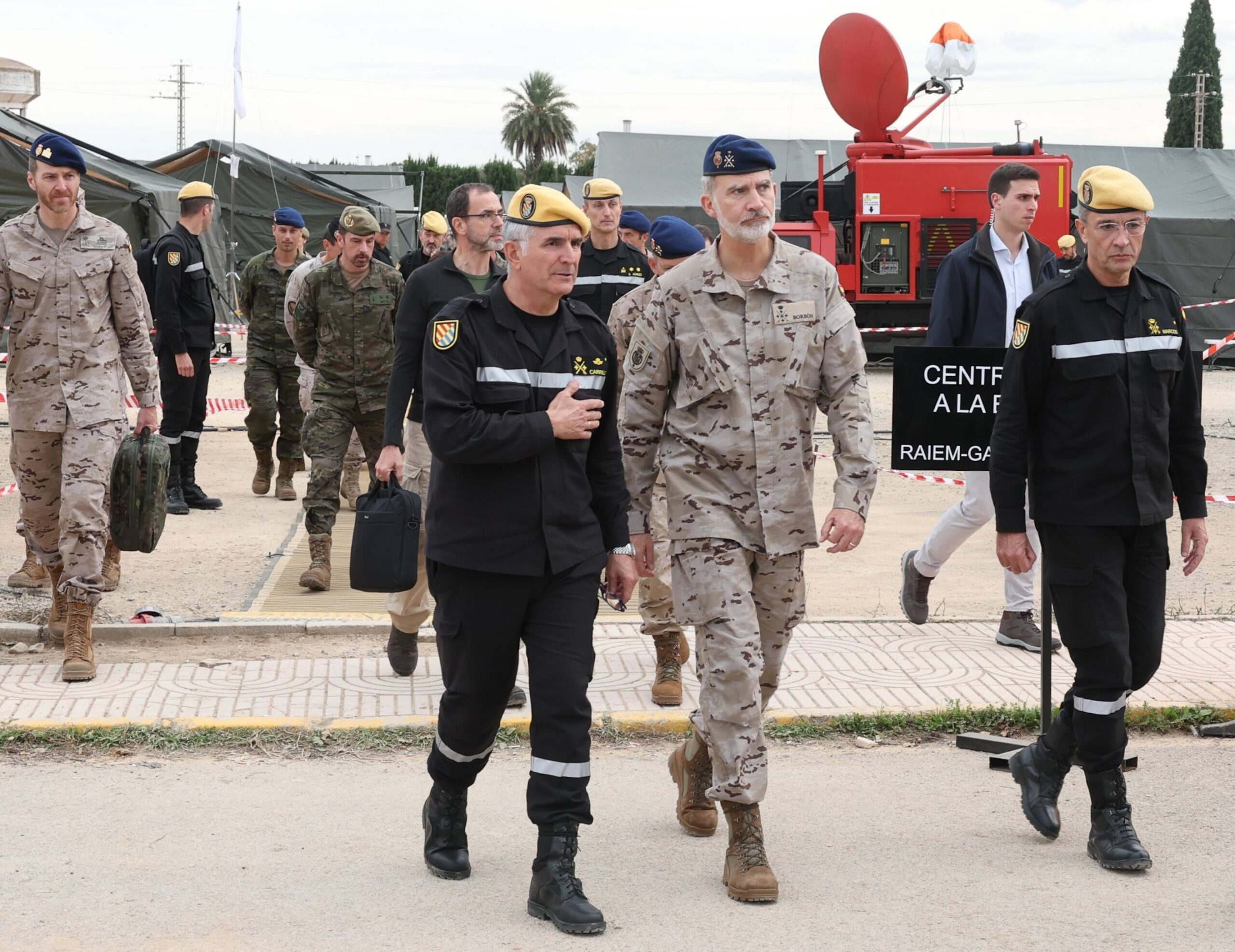 King of Spain praises work of armed forces during visit to Valencia flood zone