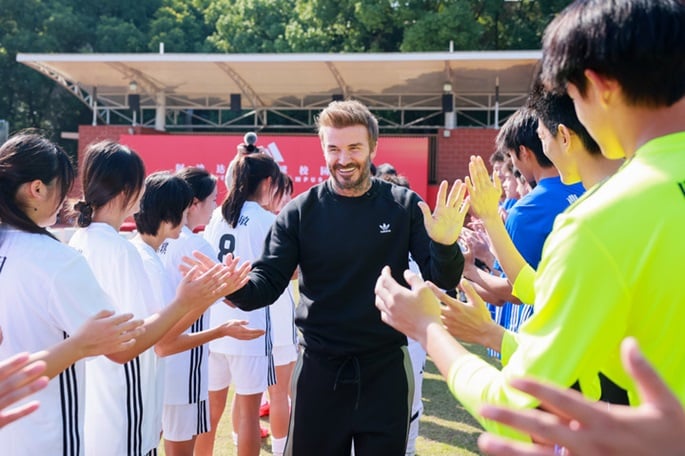 Beckham expects children to stay happy, focused while playing football