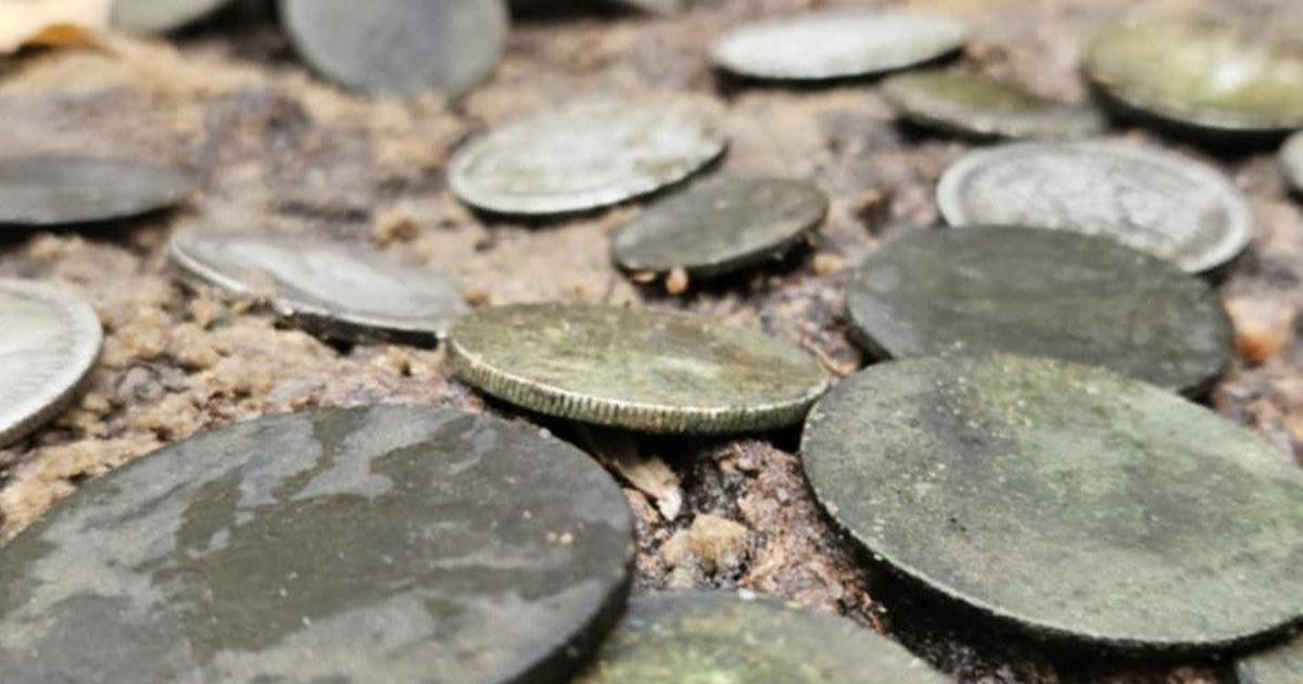 Archaeologists find ancient treasures near grave of WWII soldier in Poland