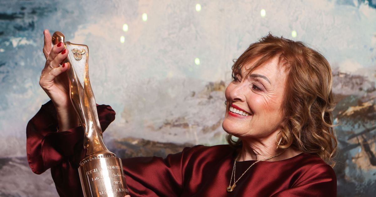 Mary Kennedy stuns in burgundy as she's honoured with a Lifetime Achievement Award