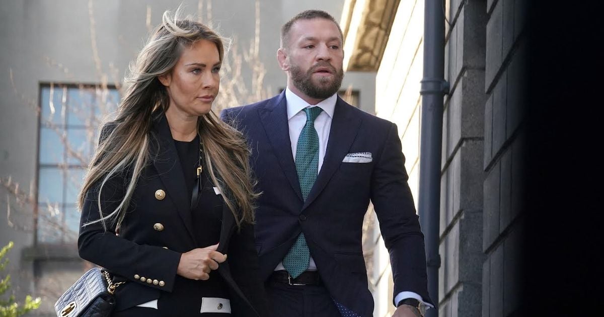 Dee Devlin's chic court ensemble accessorised with designer bag as she joins Conor McGregor in court