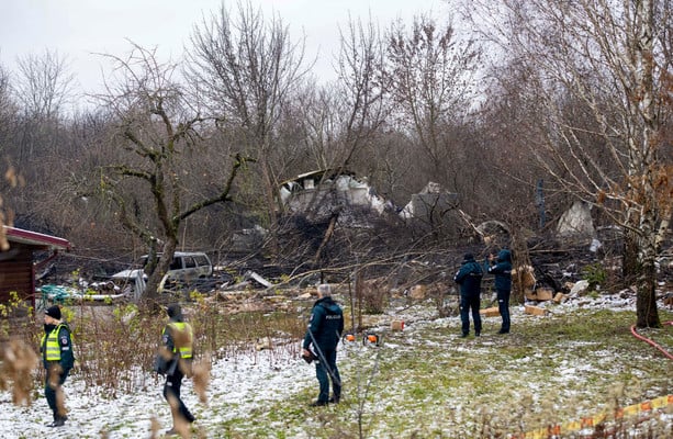 One dead and three injured after cargo plane crashes into house in Lithuania