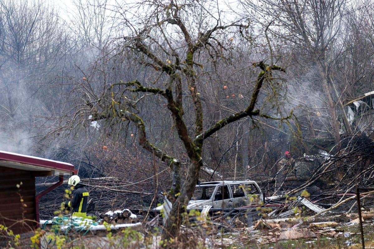 DHL cargo plane crash: At least one person dead as aircraft comes down in Lithuania hitting house near airport