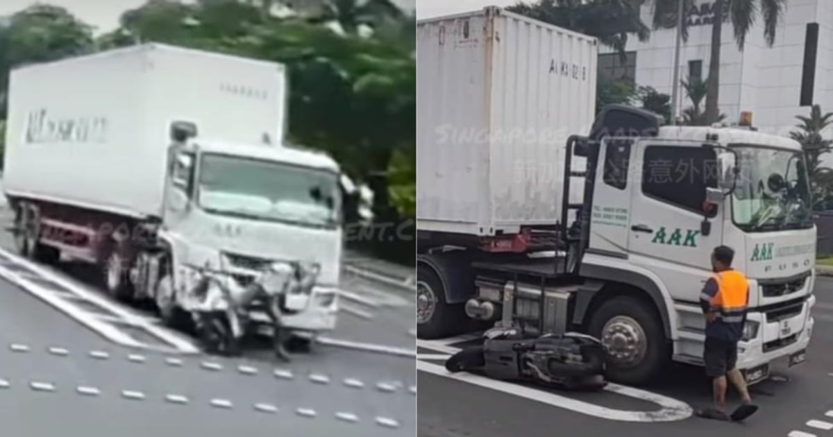 Motorcyclist in blind spot almost gets run over by container truck at Tuas West traffic junction