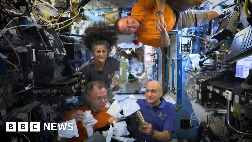 Astronauts unbox Thanksgiving meal aboard ISS