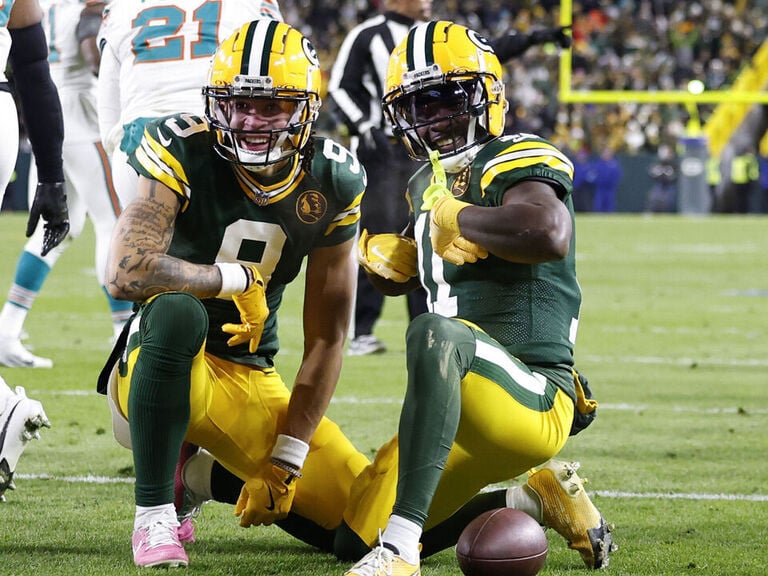 Love, Reed lead Packers past Dolphins to cap Thanksgiving slate