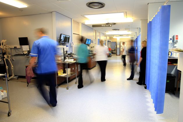 Hospitals to empty beds to cope with expected influx of up to 900 flu patients and to prevent trolley gridlock