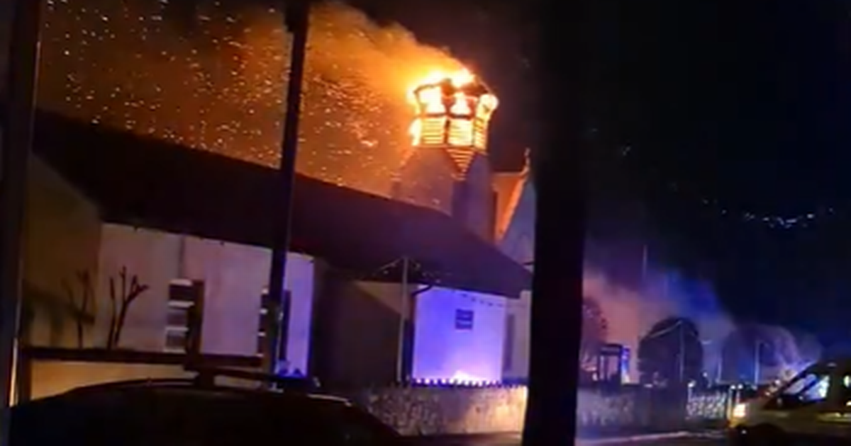 WATCH: Church spire in Clare crashes to the ground in flames after being struck by lightning