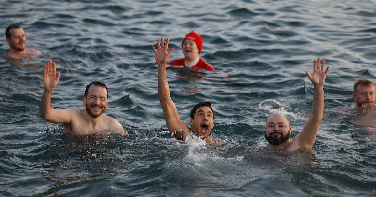 Tailbacks from Forty Foot stretch for miles as Christmas swimmers descend