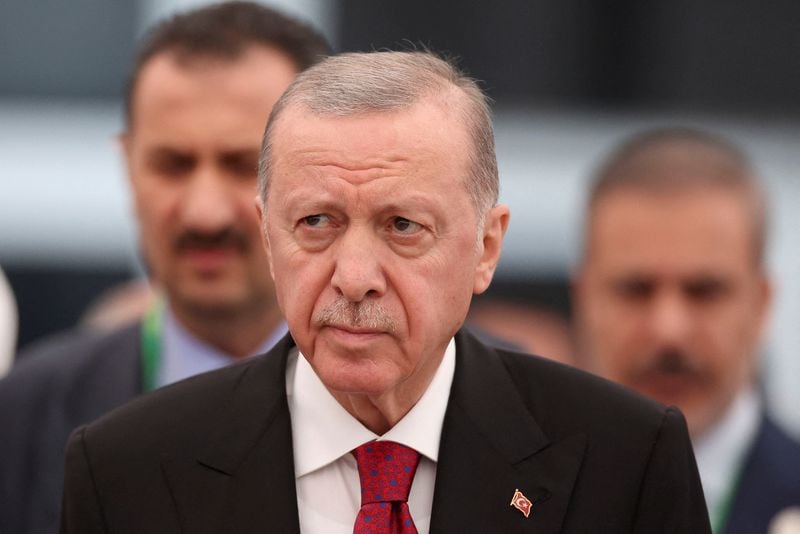 Kurdish militia in Syria will be buried if they do not lay down arms, Turkey's Erdogan says