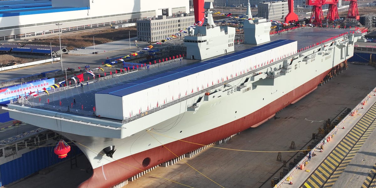 See aboard China's new massive assault ship that can launch fighter jets or drones