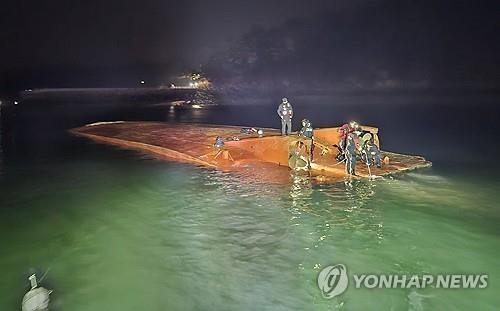 (2nd LD) Car ferry capsizes off southwestern coast; 2 rescued, 5 missing