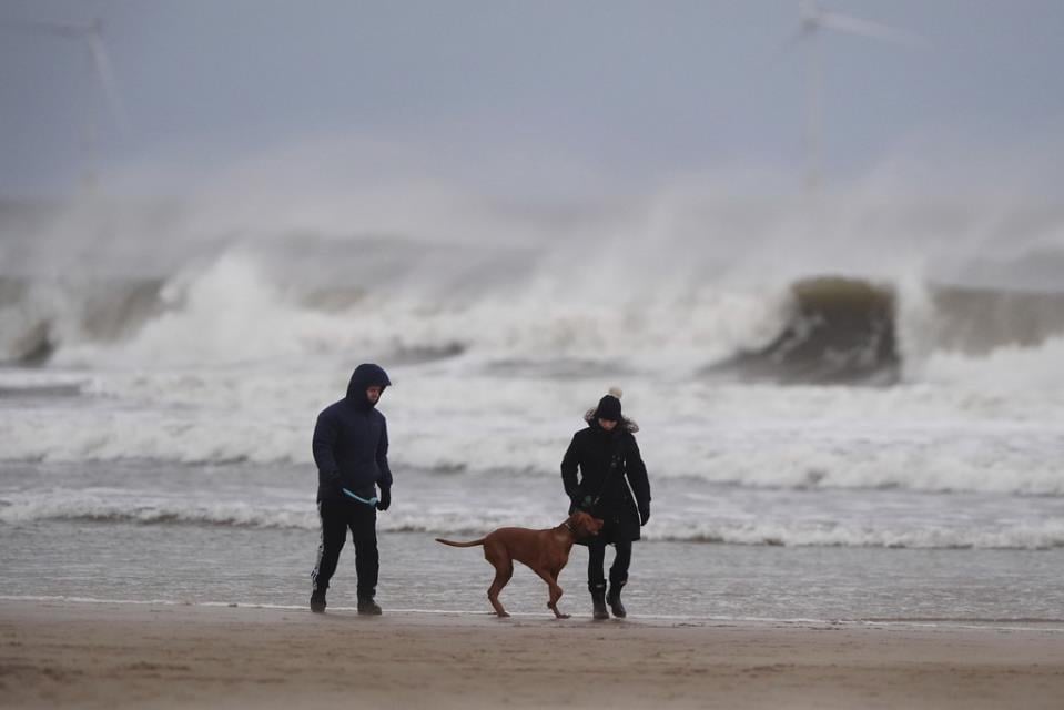 Wind, rain and the threat of floods play the spoiler for New Year's festivities in the UK