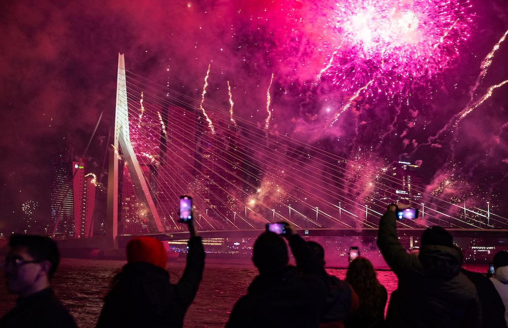 Dutch ring in New Year with fireworks, car fires and riot police