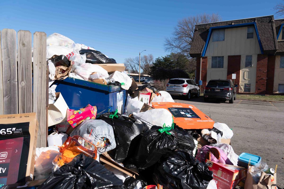 Topeka intervenes to clean up and cite landlord over trash piles at apartments