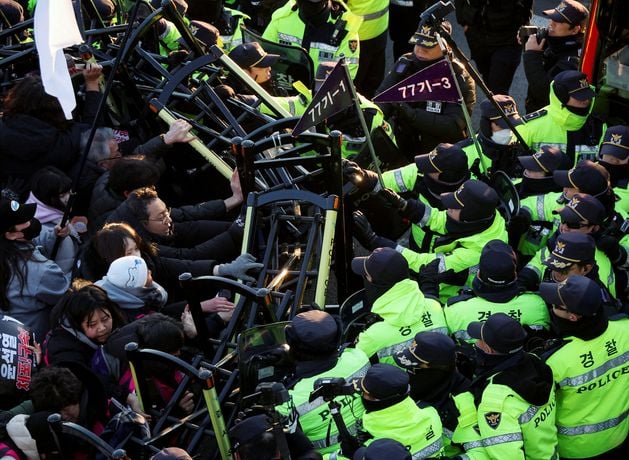 South Korean Presidential guards block arrest of Yoon after tense six-hour stand-off