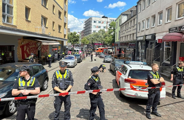 Man wielding pickaxe shot by police in Hamburg hours before city hosts Euros match