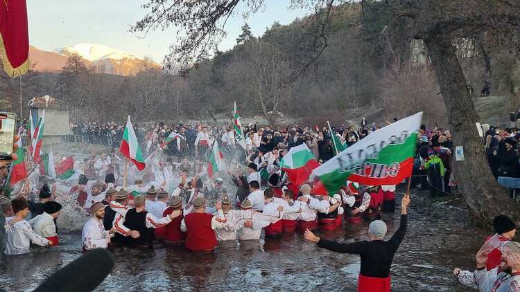 Over 100 Brave Icy Tundzha River in Kalofer for Traditional Horo Dance on Epiphany