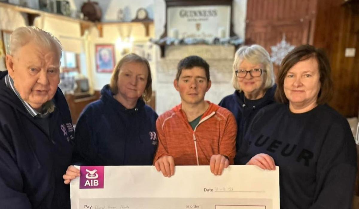 Man who ran and walked through 2024 presents cheque of west Donegal fundraiser