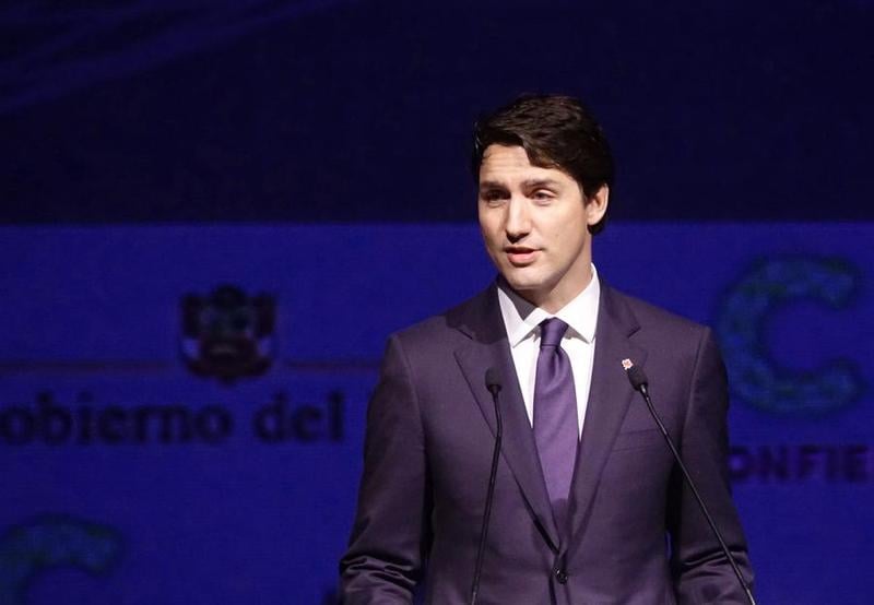 Canadian PM to step down while opposition complains