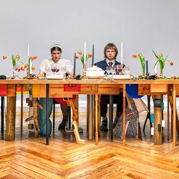 Capitalism debuts 34-legged table that "democratises discomfort"