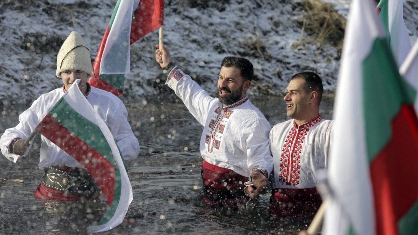 Bulgarians celebrate the feast of Epiphany with a ritual plunge into icy rivers