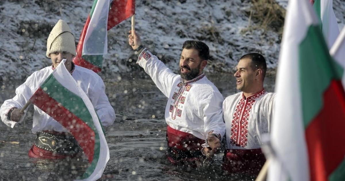 Bulgarians celebrate the feast of Epiphany with a ritual plunge into icy rivers