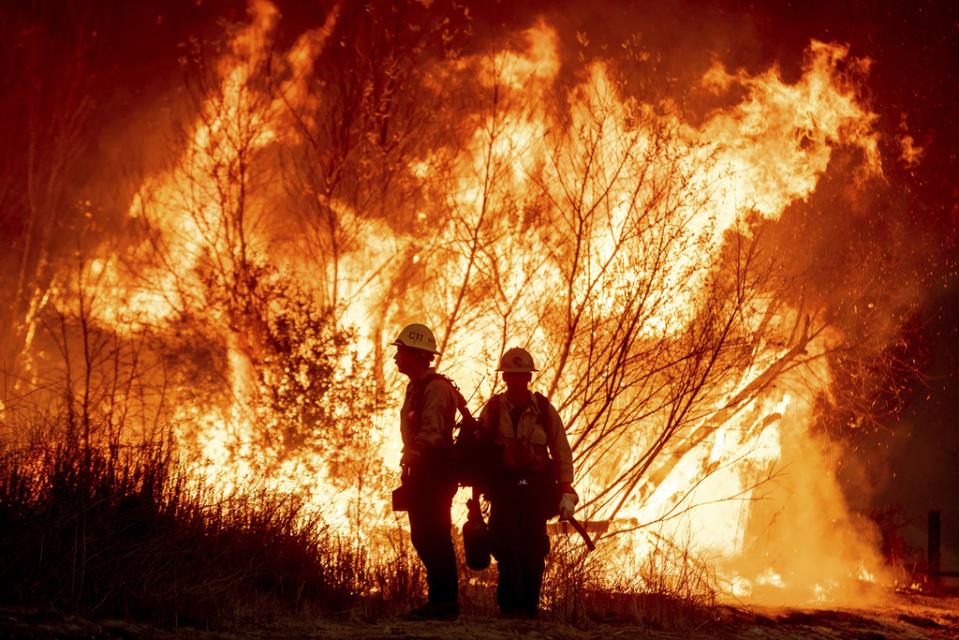 LA area's 2 biggest blazes burn at least 10,000 structures, while new fire leads to more evacuations