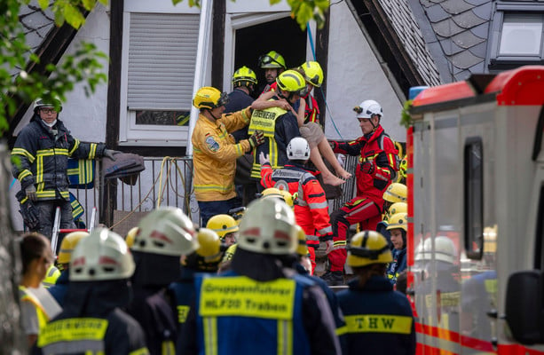 Two dead and several trapped after hotel partially collapses in Germany