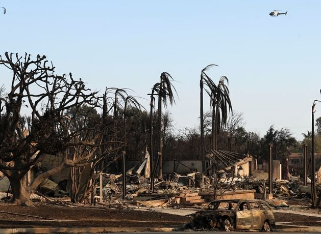 Los Angeles wildfires: firefighters make minor progress as intense winds ease briefly; stay at home warning issued over smoke pollution