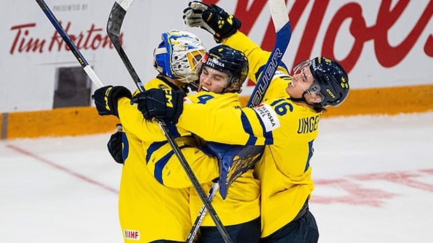 Swedes hang on for win over resilient Latvians, advance to world junior semifinals